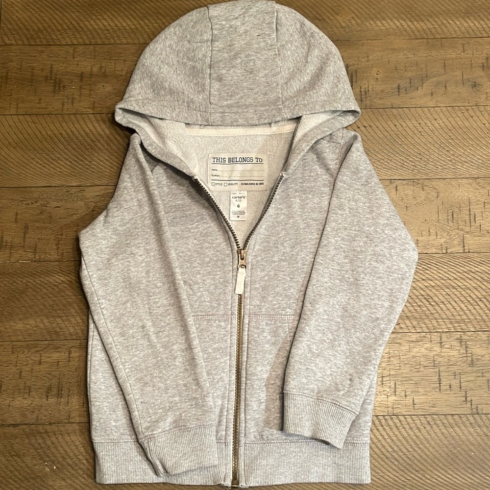 Carters kid size 6 fleece zip up hoodie with pockets.